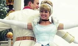 Cinderella and Prince Charming Dance in front of Cinderella Castle at Magic Kingdom in Orlando