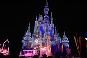 View of the Cinderella Castle lit for the Frozen Holiday Wish Show